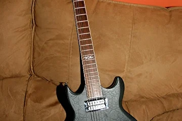 Ibanez 1220 Prestige-really nice SG-type mahogany body japanese guitar,with fabulous classic and modern sound,fast & furious 22-fret prestige neck,and classic set of Duncans-'59+JB.
I was really impressed by sound and playbility when I got it.
SOLD.