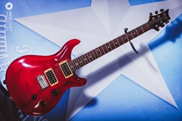 My new axe PRS CE 24 Trans Red 1997.
It's just great,with one-piece mahogony body and one-piece maple neck,and amazing fantastic sound.
I'm really happy to get this one))
