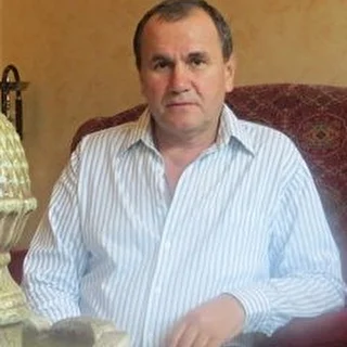 Александр Милкин
