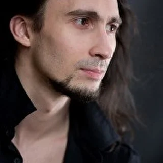 Денис Устюжанин