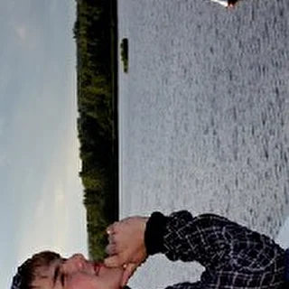Е.Л.